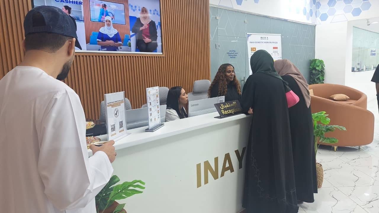 Visitors at the INAYA Ajman reception desk