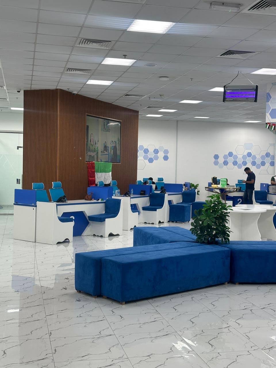 INAYA Ajman waiting benches and numbered counters