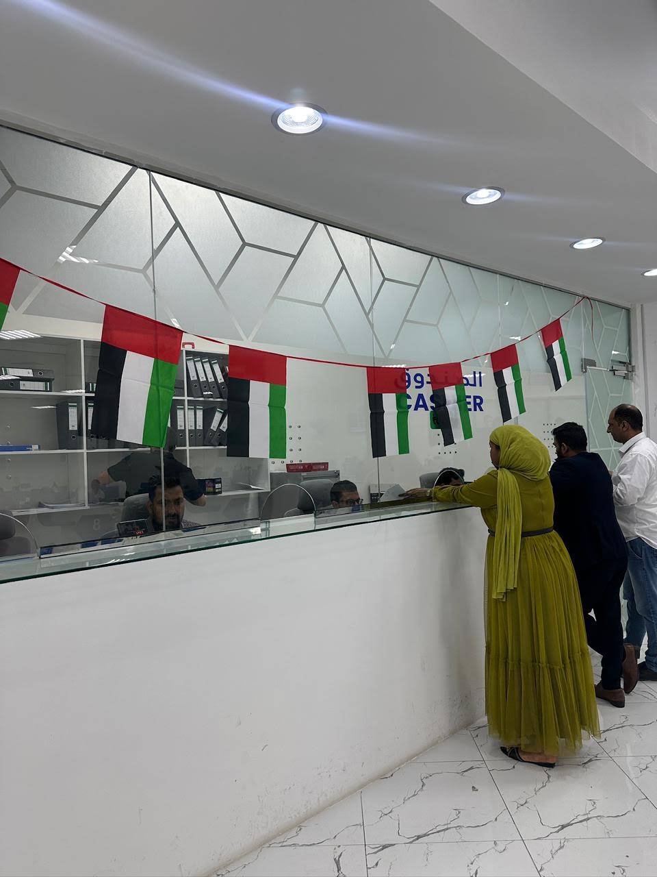 INAYA Ajman document-service counter and reception area